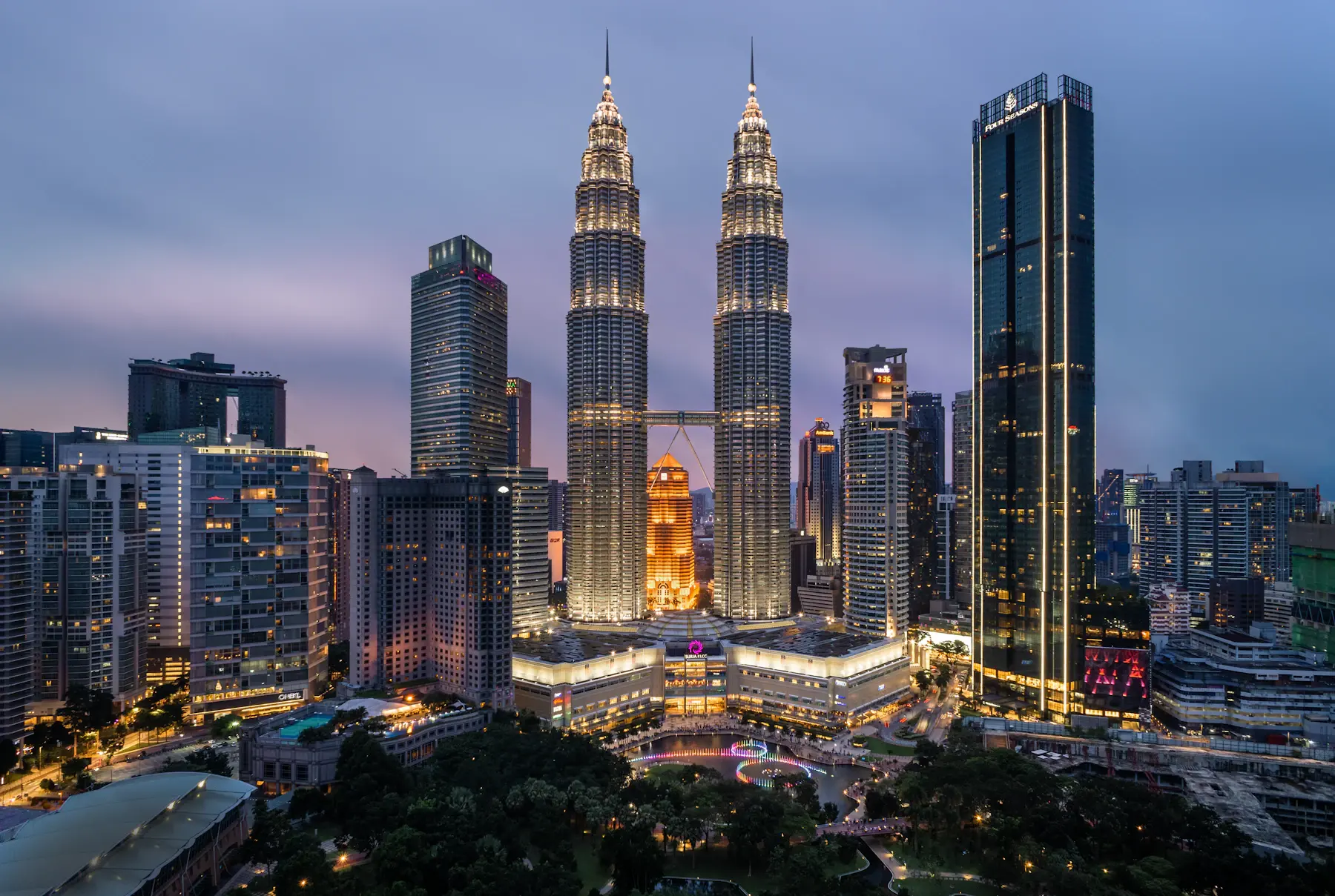 The Petronas Twin Towers and Kuala Lumpur skyline at dusk